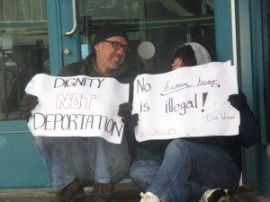 James and Annie block the doors to the Buffalo ICE office